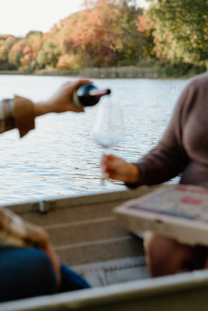 couple enjoying wine out on a boat